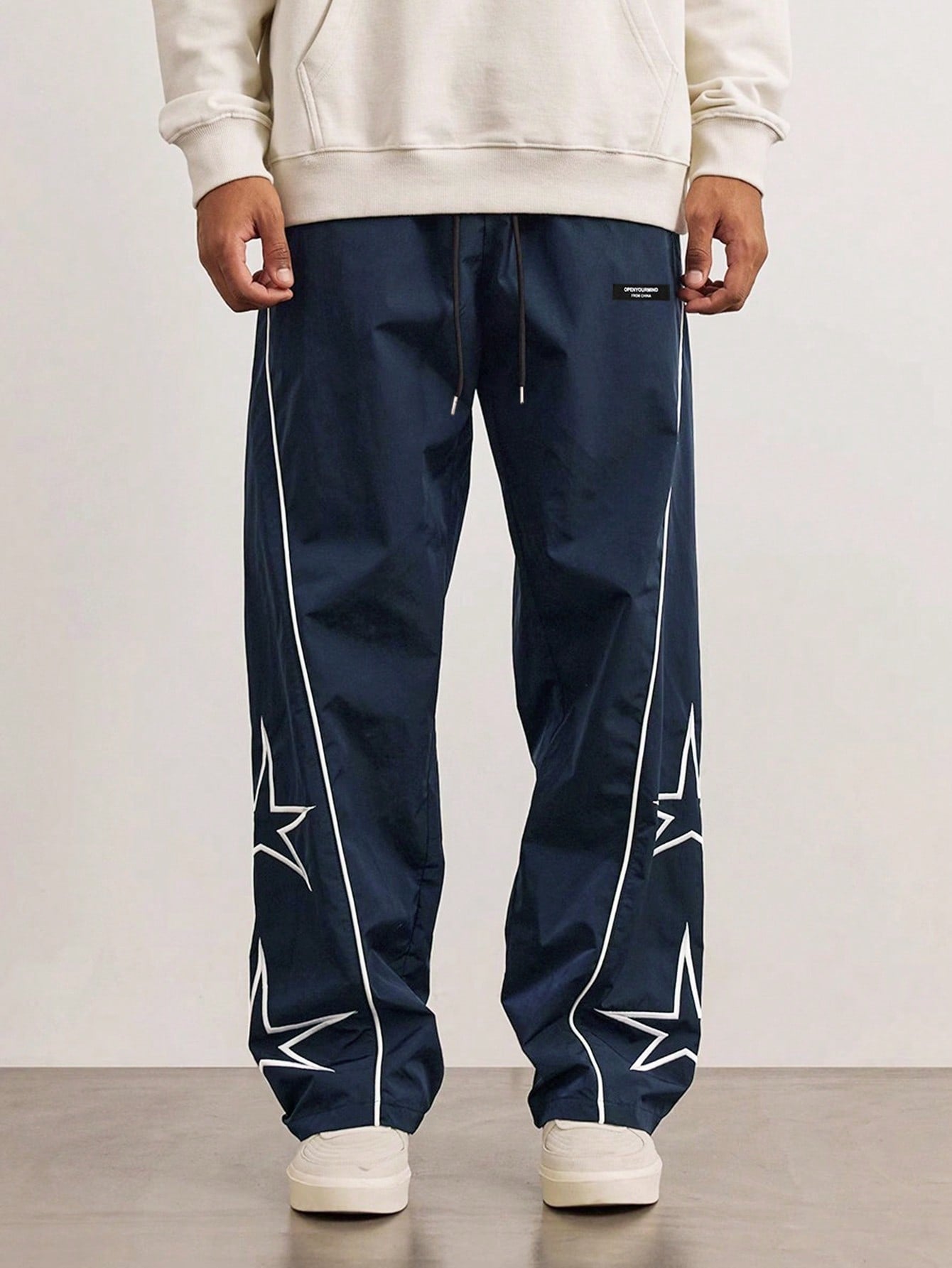 Men Loose Embroidery Star Pattern Contrast Piping Pants